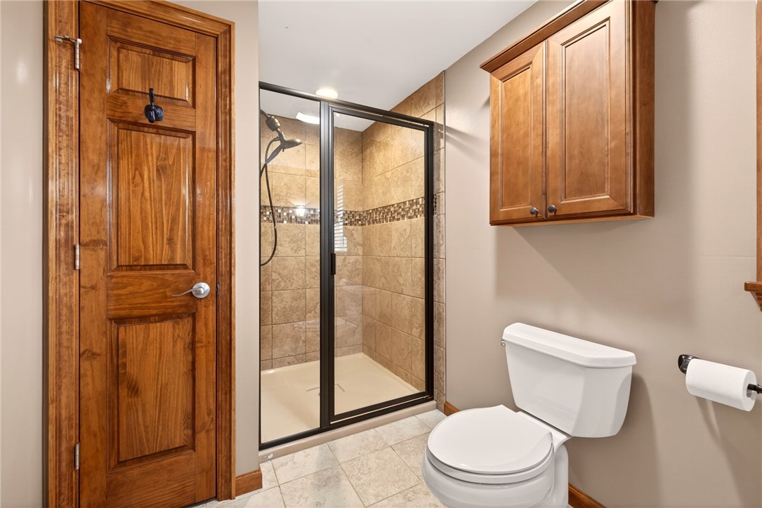 5951 Holmes Hill Road Livonia, NY 14435 - Photo 21 of 35 On 2nd Floor - updated primary en-suite with tiled