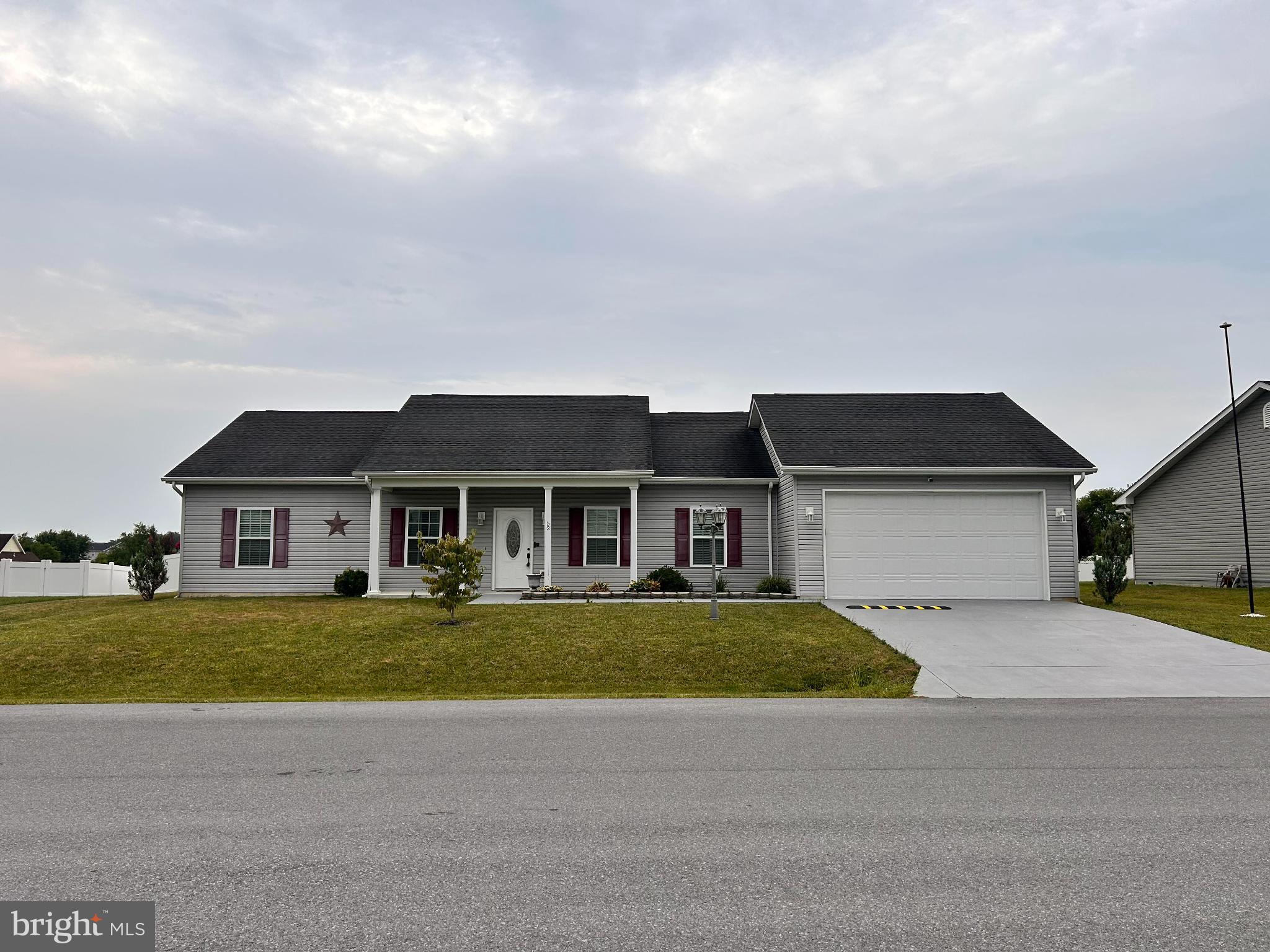 52 Harness Race Road Martinsburg, WV 25404 - Photo 1 of 16 a house view with a garden space
