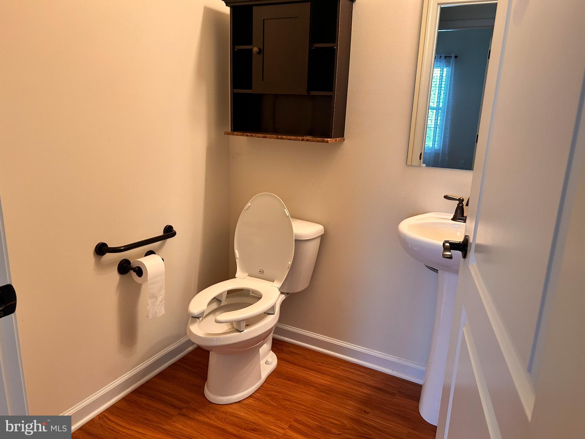 52 Harness Race Road Martinsburg, WV 25404 - Photo 15 of 16 a bathroom with a toilet and a sink