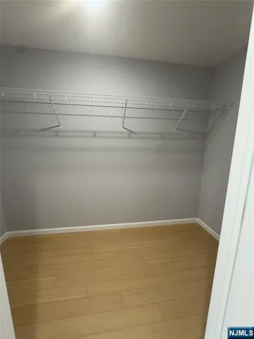 a view of a room with racks on the wall