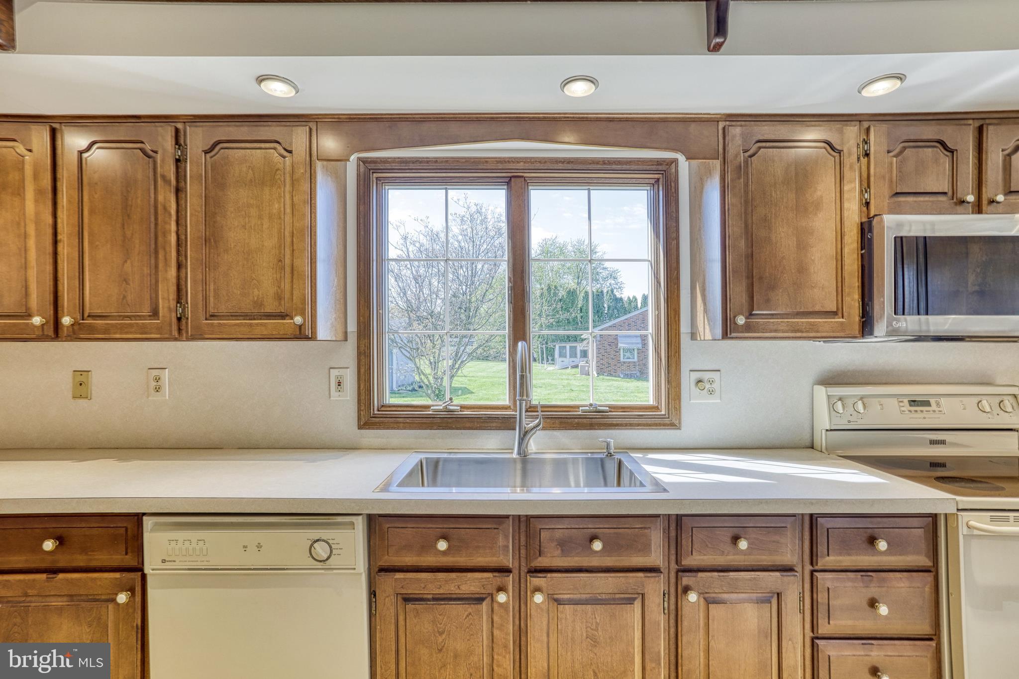 110 Singer Road New Freedom, PA 17349 - Photo 19 of 79 Kitchen w/large window view overlooking backyard