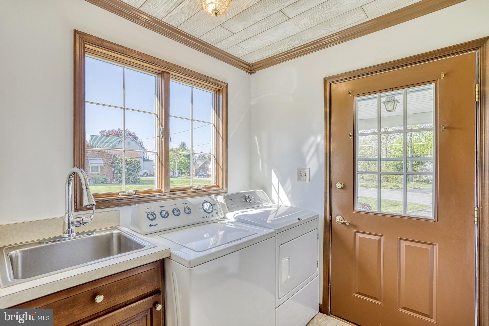 110 Singer Road New Freedom, PA 17349 - Photo 21 of 79 Laundry room with a sink and lots of light