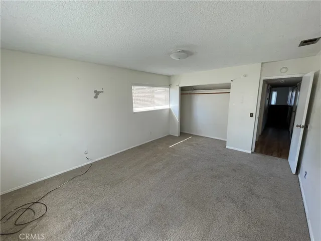 an empty room with closet