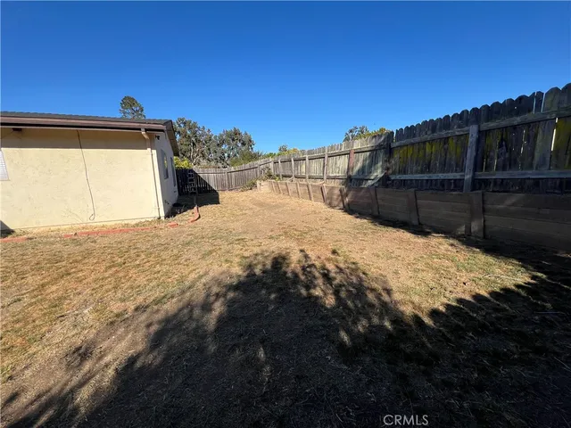a view of wooden fence and floor