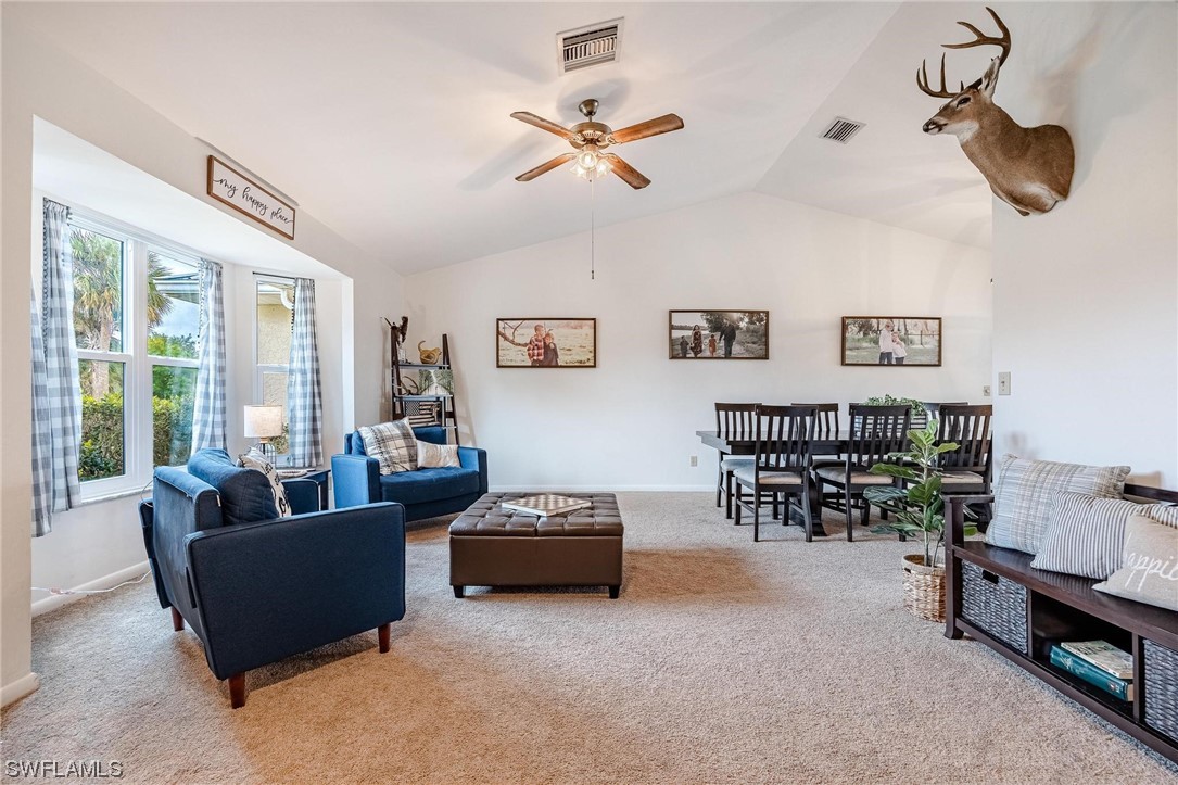 1367 Frontier Circle LaBelle, FL 33935 - Photo 11 of 37 a living room with furniture and a window