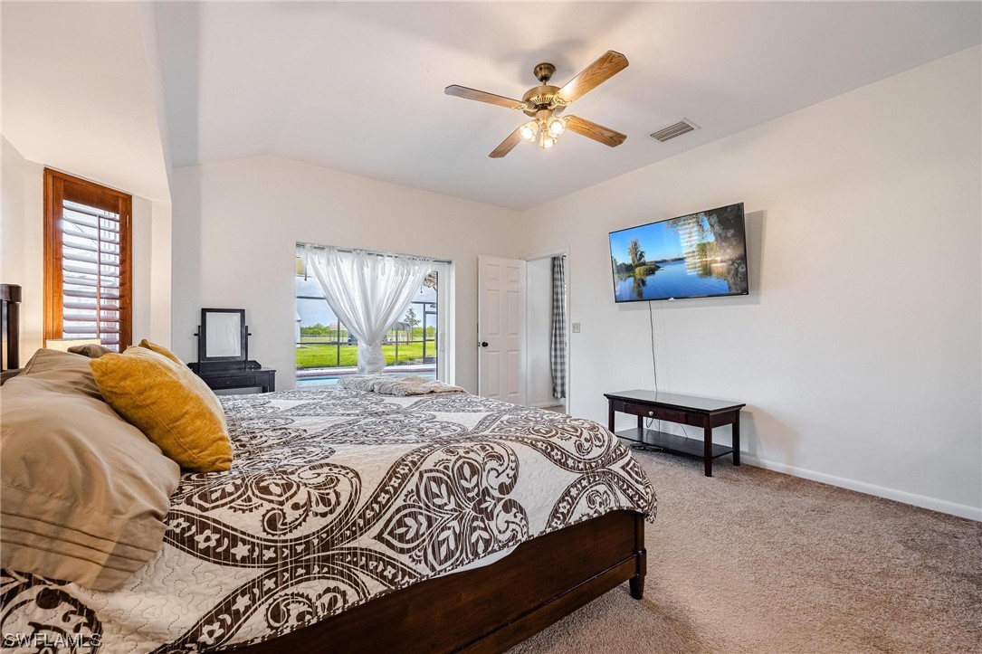 1367 Frontier Circle LaBelle, FL 33935 - Photo 19 of 37 a bedroom with a bed and a window