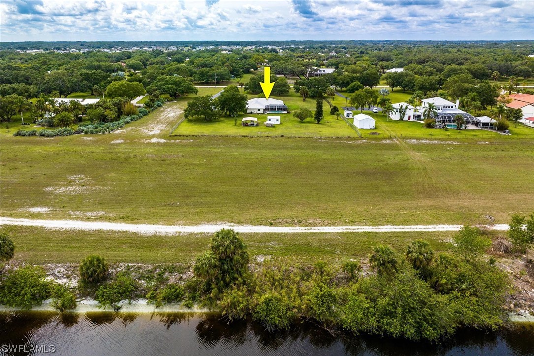 1367 Frontier Circle LaBelle, FL 33935 - Photo 2 of 37 a view of a city with an ocean