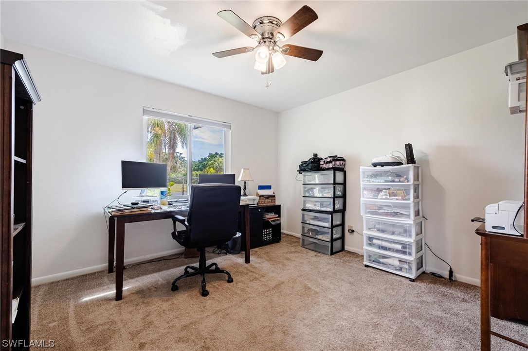 1367 Frontier Circle LaBelle, FL 33935 - Photo 25 of 37 a view of a workspace with furniture