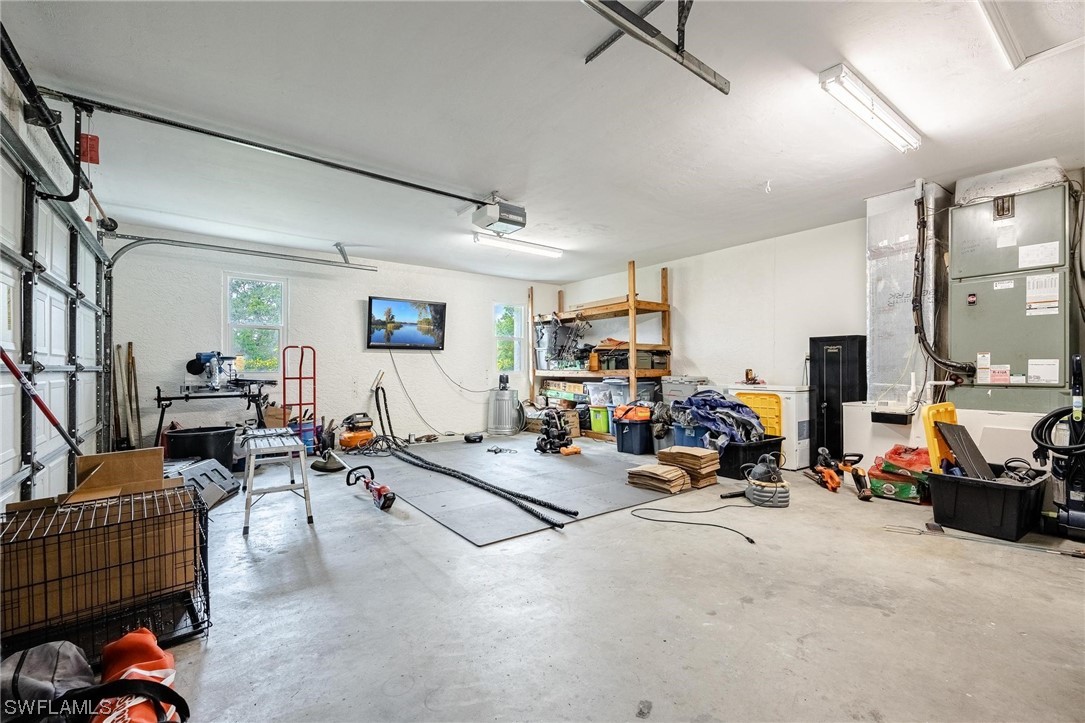1367 Frontier Circle LaBelle, FL 33935 - Photo 28 of 37 a view of a room with gym equipment