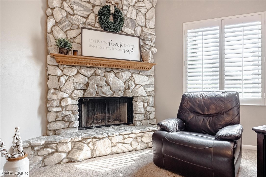 1367 Frontier Circle LaBelle, FL 33935 - Photo 6 of 37 a living room with furniture window and a fireplace