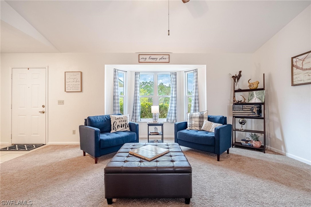 1367 Frontier Circle LaBelle, FL 33935 - Photo 9 of 37 a living room with furniture and a window