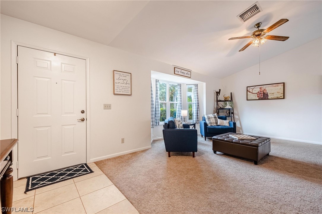 1367 Frontier Circle LaBelle, FL 33935 - Photo 10 of 37 a living room with furniture and a window