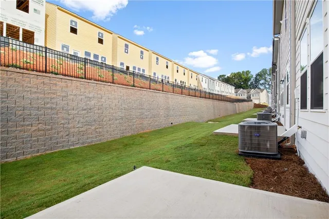 a front view of a building with garden