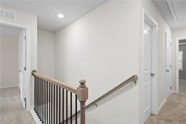 a view of a hallway with entryway