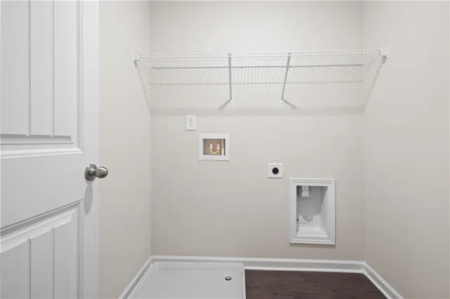 a view of small space with empty racks on the wall