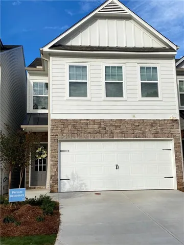 a view of a street with a building in the background