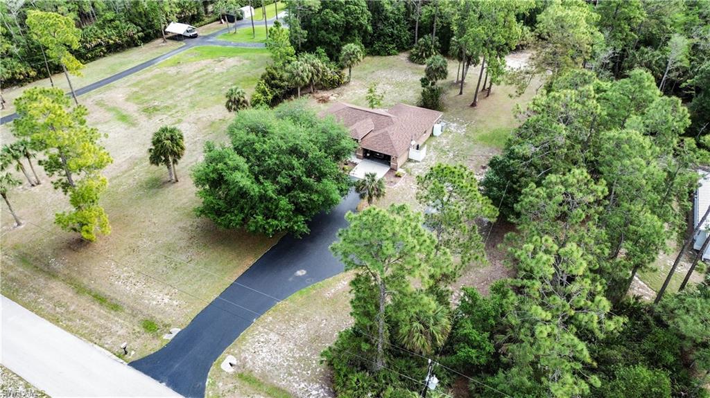 an aerial view of residential house with outdoor space