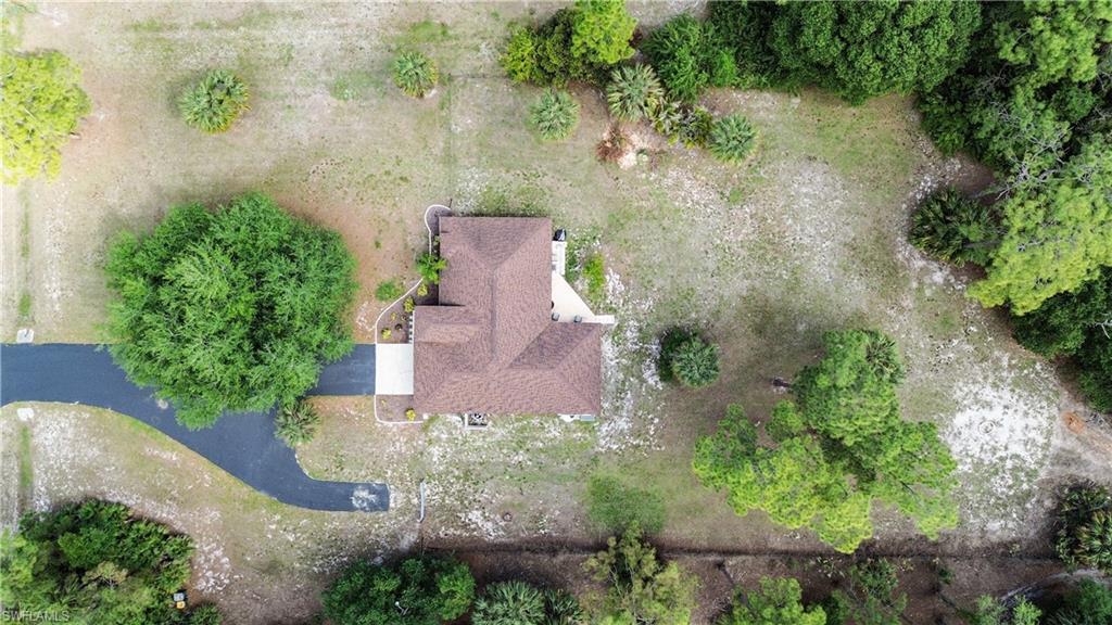 2910 2nd Street Northeast Naples, FL 34120 - Photo 34 of 36 an aerial view of a house with a yard