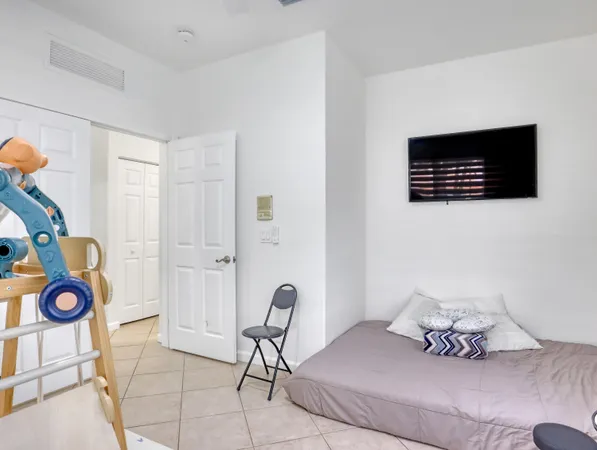 a bedroom with a bed and furniture