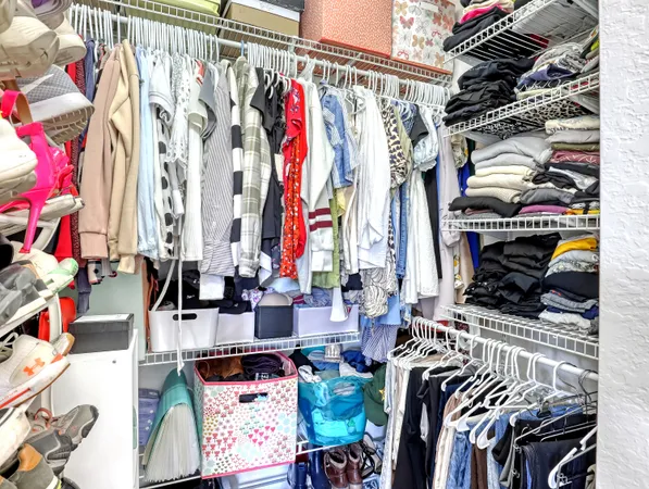 a bathroom with a shower and a sink