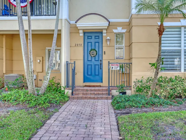 a front view of a house with a porch