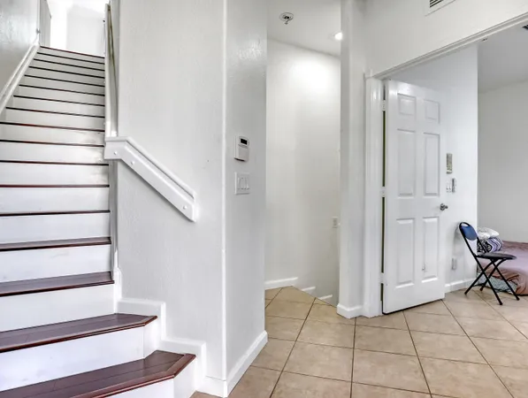 a view of an entryway with staircase