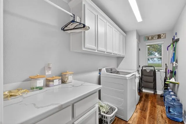 a bathroom with a toilet a sink and a mirror
