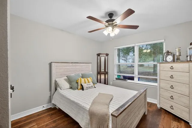 a living room with furniture a window and a table