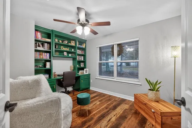 a view of a patio with swimming pool table and chairs