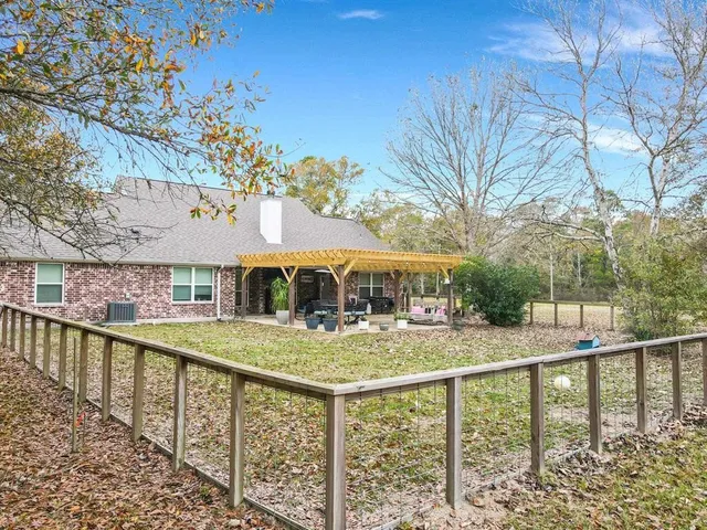 a view of a lake with a yard