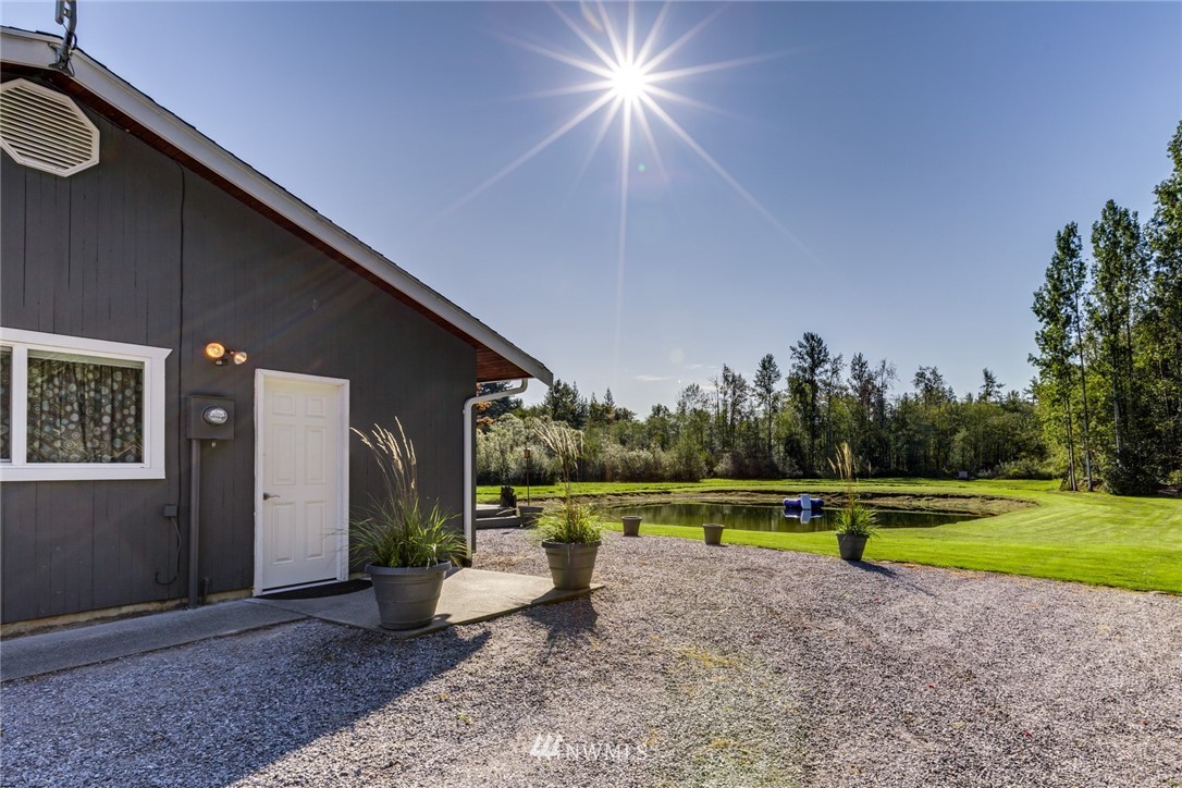 3141 Loomis Trail Road Custer, WA 98240 - Photo 4 of 25 a view of a backyard with swimming pool and a yard