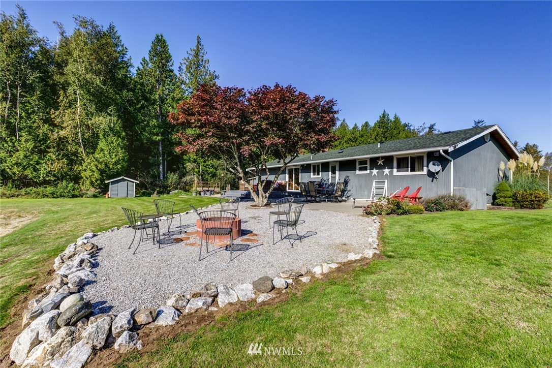 3141 Loomis Trail Road Custer, WA 98240 - Photo 8 of 25 swimming pool view with a seating space and garden view