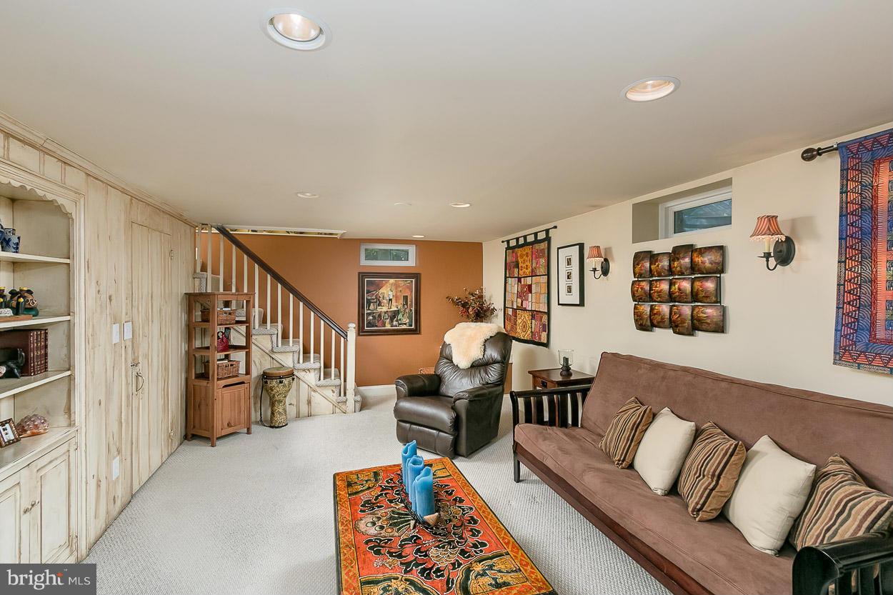 505 Sussex Road Towson, MD 21286 - Photo 26 of 30 a living room with furniture and stairs