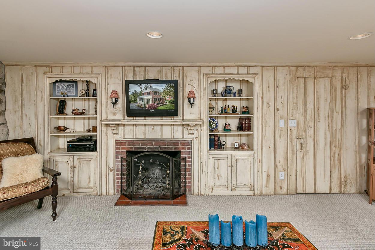 505 Sussex Road Towson, MD 21286 - Photo 27 of 30 a living room with furniture and a fireplace