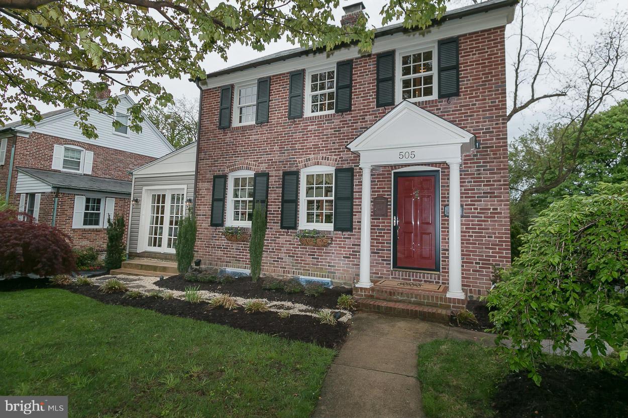 505 Sussex Road Towson, MD 21286 - Photo 6 of 30 a front view of a house with a yard and porch