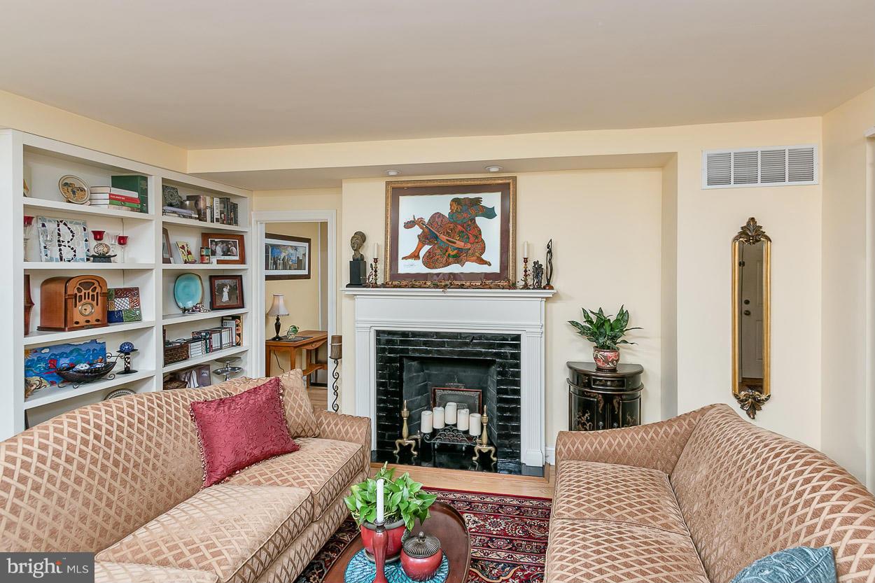 505 Sussex Road Towson, MD 21286 - Photo 10 of 30 a living room with furniture and a fireplace