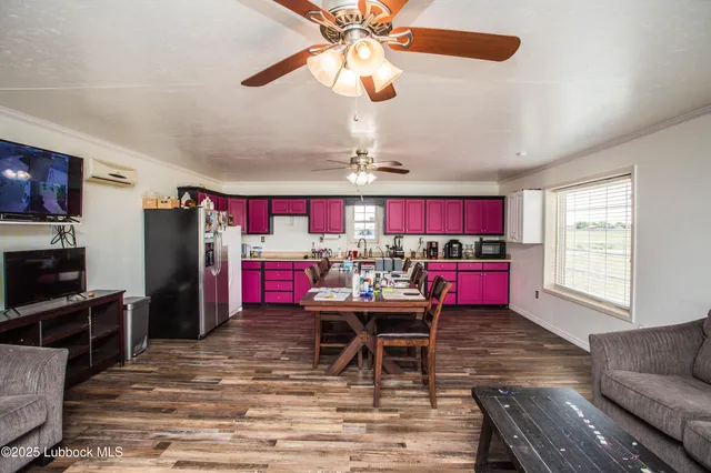 a bathroom with a granite countertop toilet sink and mirror