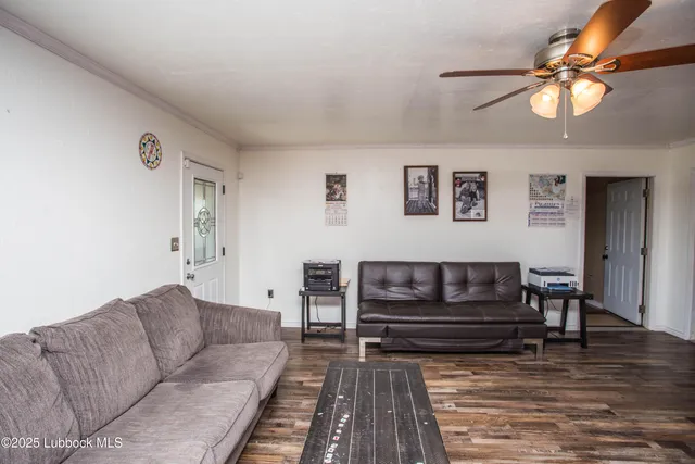 a room with furniture and a wooden floor
