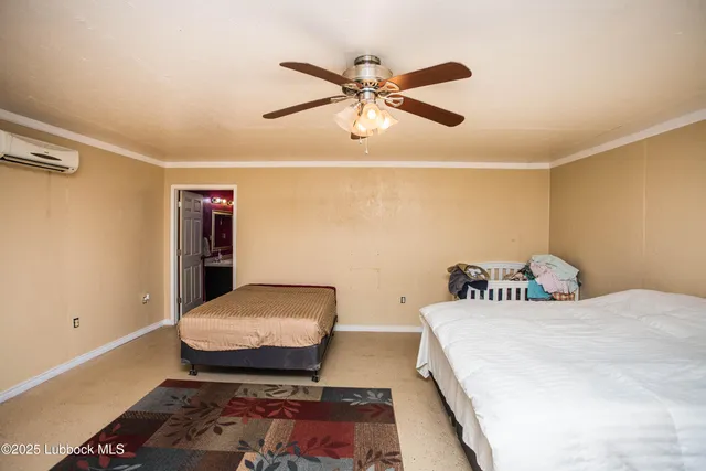 a bathroom with a toilet and a view of bathroom