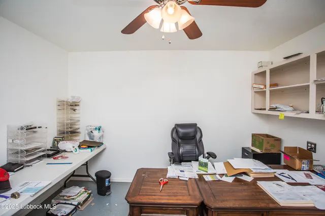 a room with furniture and next to a window