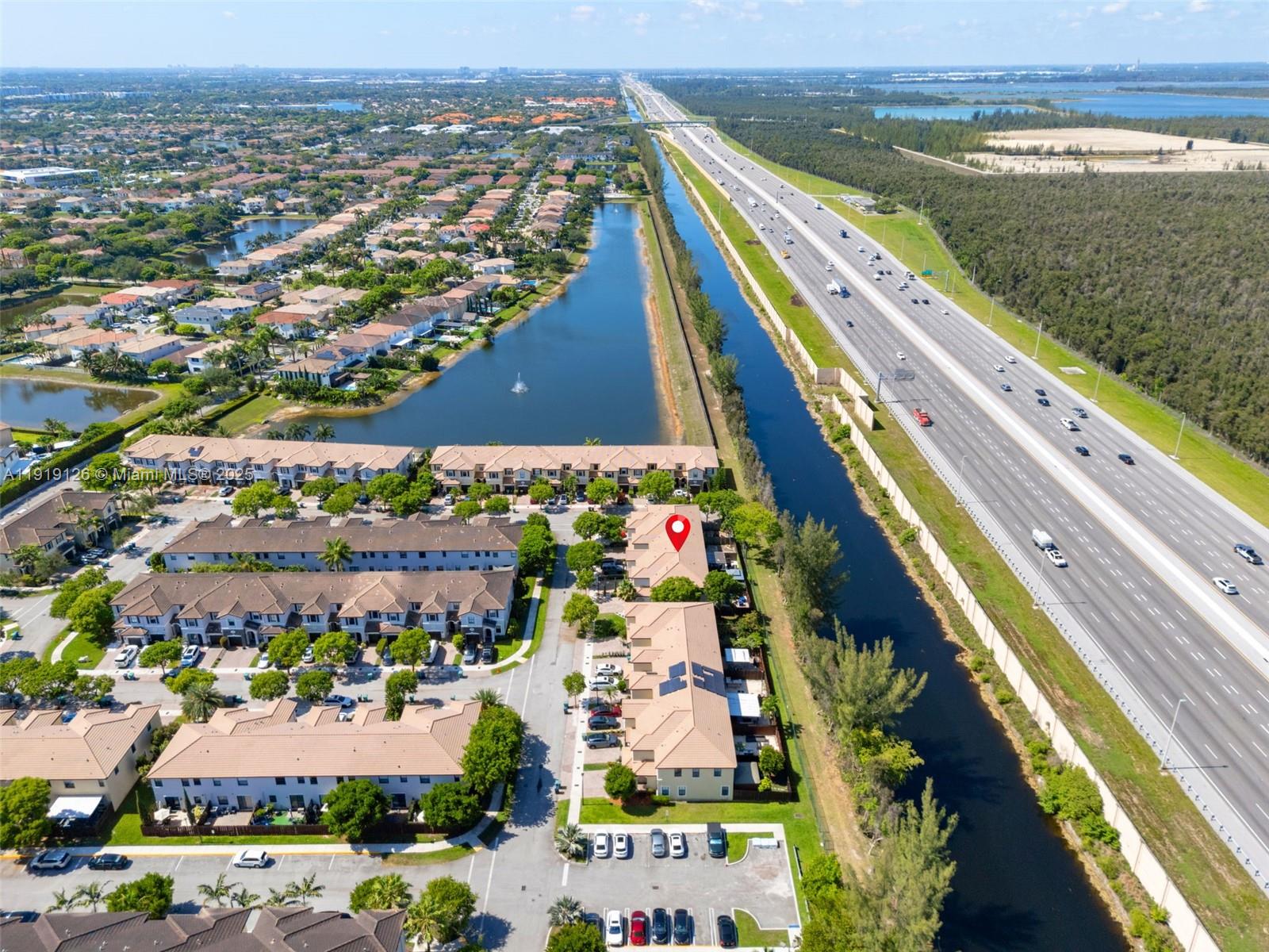 8780 Northwest 116th Path Doral, FL 33178 - Photo 3 of 32 a view of lake and yard