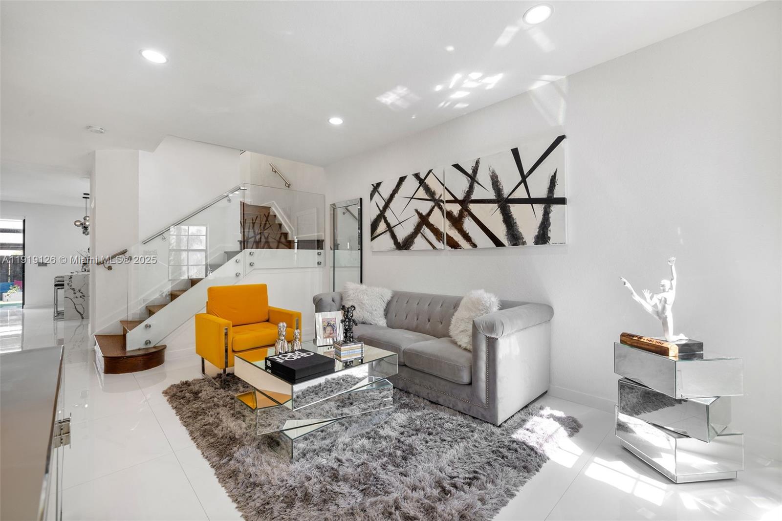 8780 Northwest 116th Path Doral, FL 33178 - Photo 7 of 32 a living room with furniture and wooden floor