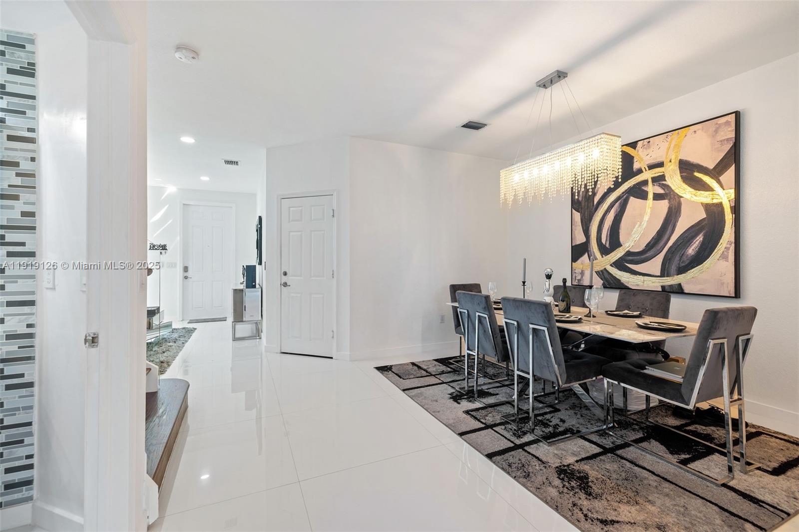 8780 Northwest 116th Path Doral, FL 33178 - Photo 9 of 32 a view of a workspace with furniture