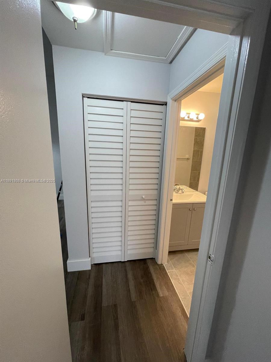 5040 Sanctuary Way, Unit B West Palm Beach, FL 33417 - Photo 7 of 10 a view of a closet area of a house