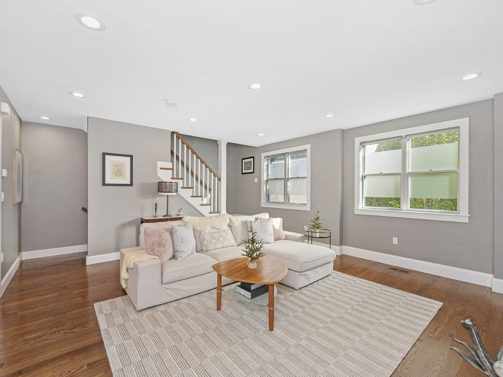 198 California Street, Unit 3 Newton, MA 02458 - Photo 11 of 34 a living room with furniture and a window