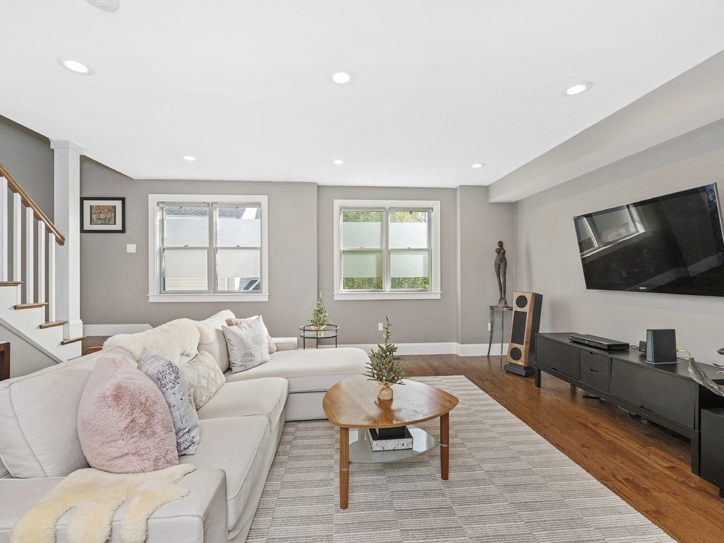 198 California Street, Unit 3 Newton, MA 02458 - Photo 12 of 34 a living room with furniture and a flat screen tv