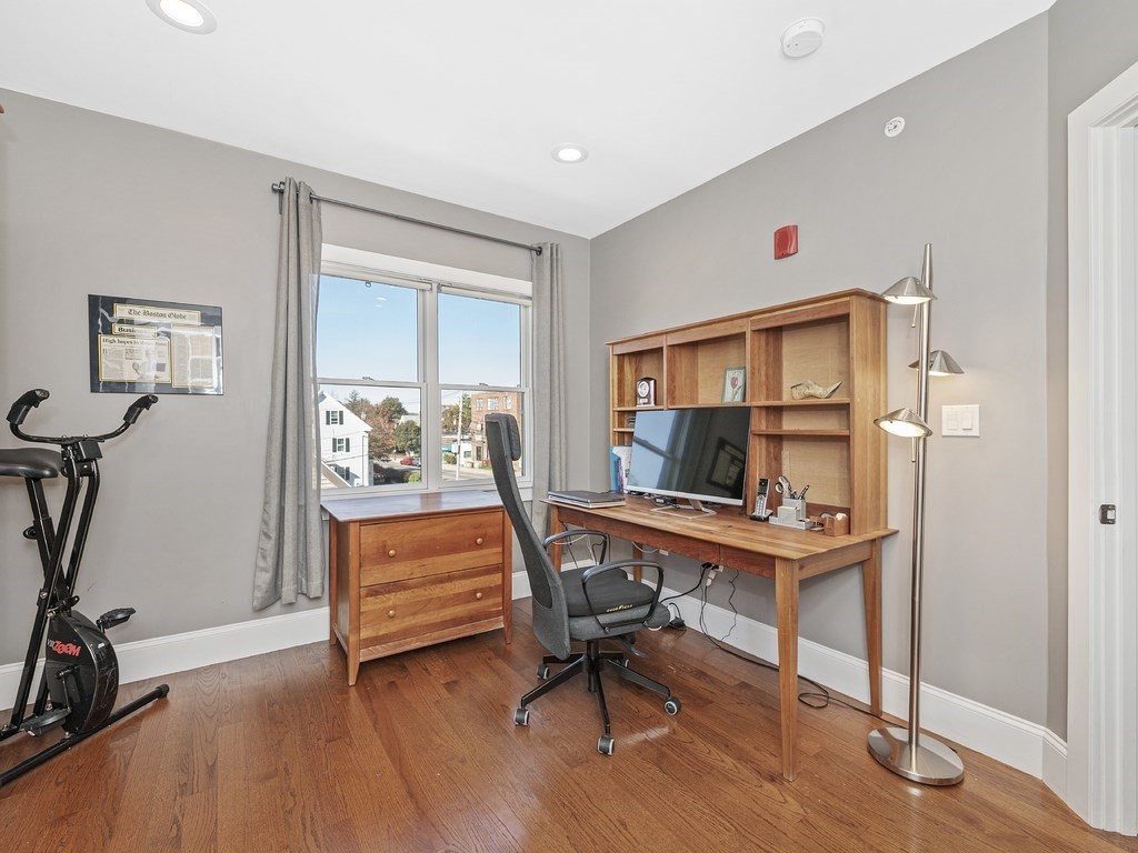 198 California Street, Unit 3 Newton, MA 02458 - Photo 21 of 34 a view of a workspace with furniture and a window