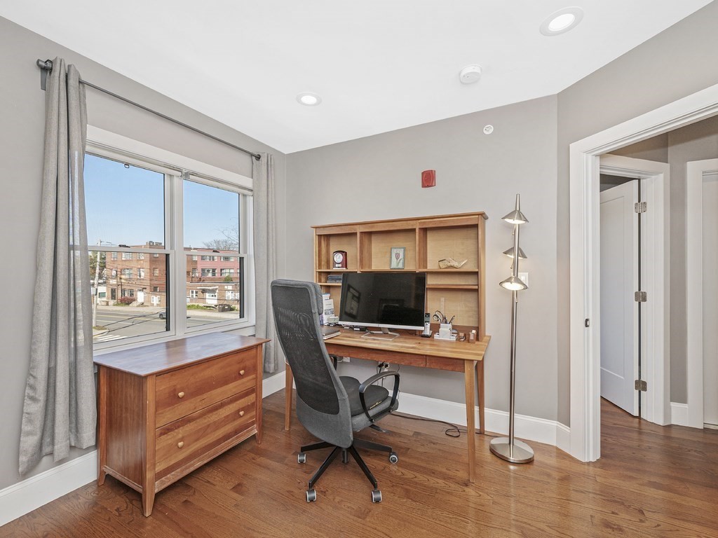 198 California Street, Unit 3 Newton, MA 02458 - Photo 22 of 34 a view of a workspace with furniture and a window
