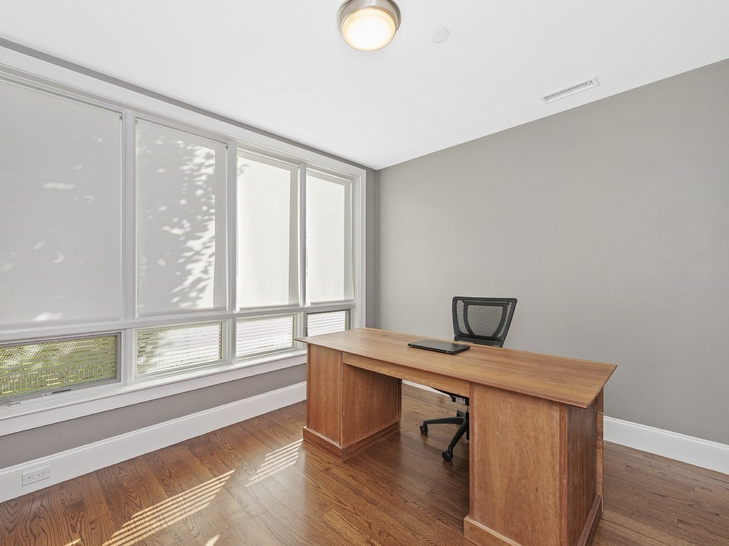 198 California Street, Unit 3 Newton, MA 02458 - Photo 23 of 34 a view of workspace with wooden floor windows