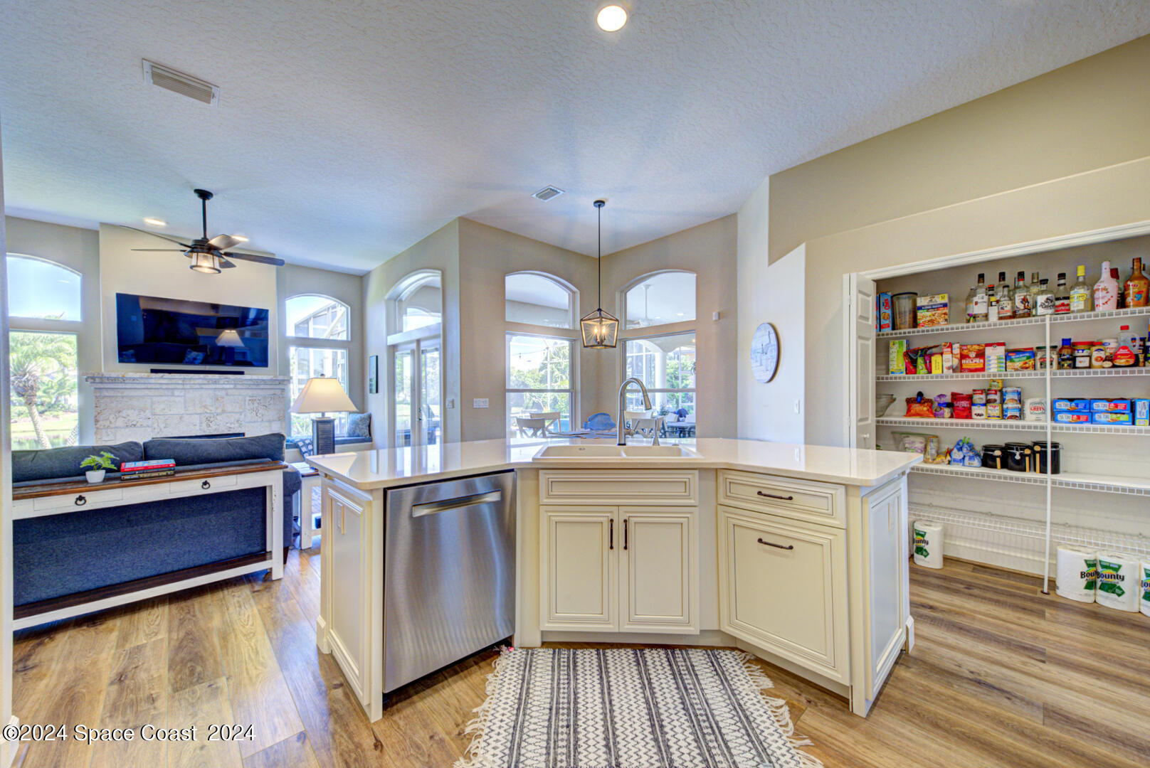 4070 Stoney Point Road Melbourne, FL 32940 - Photo 13 of 75 a kitchen with stainless steel appliances granite countertop a stove and a sink